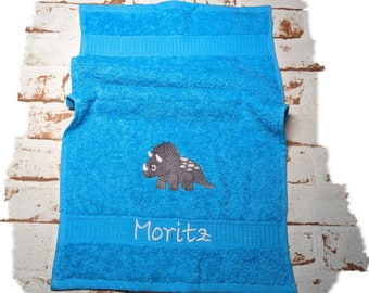 Dino towel embroidered with the name Moritz