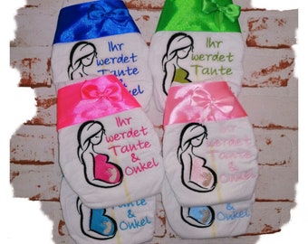 Diaper embroidered to announce pregnancy