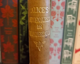 First edition Alice in Wonderland, 1870, 25th thousand printing of 1867 first edition. Lewis Carroll illustrated by John Tenniel, Macmillan.