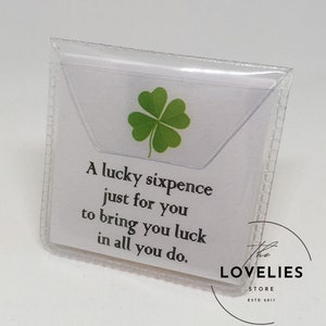 Lucky Sixpence Keepsake in protective plastic wallet. The back reads, A lucky sixpence just for you to bring you luck in all you do.