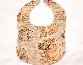 Baby and Toddler Dinner Bibs with Snap Closure, Durable Flannel Lined Bibs in Winnie the Pooh, Puppies, Kittens and Other Fun Prints