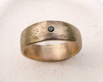 Rustic Matte Gold Wedding Band. Men’s minimal wedding ring. Small black diamond and 14k gold.