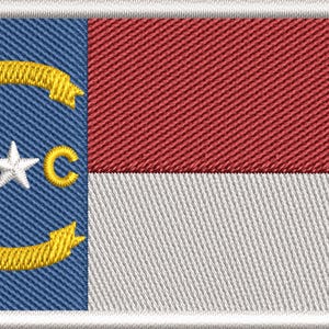 May include: Embroidered patch featuring the North Carolina state flag. The flag design includes a blue field with a gold banner, the letters "NC", and a white star. The right side has a red and white section.