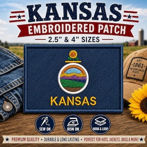 May include: A rectangular navy blue embroidered patch featuring the Kansas state seal with a sunflower, landscape, and the text KANSAS. The patch is available in 2.5 inch and 4 inch sizes, with options for sew-on, iron-on, or hook and loop backing.