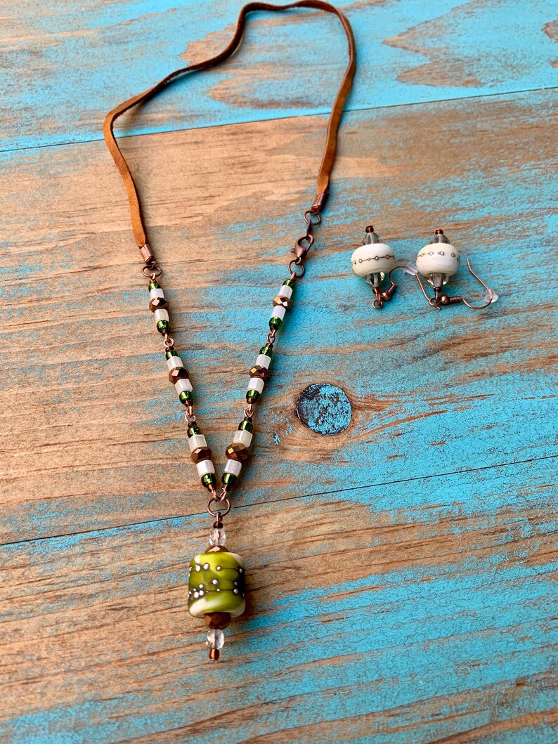 Green and ivory lampwork set