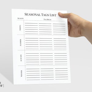 May include: A printable A4 sheet with a list of seasonal tags. The sheet is divided into four sections: Spring, Summer, Autumn, and Winter. Each section has a column for "Season" and a column for "Tag Ideas".