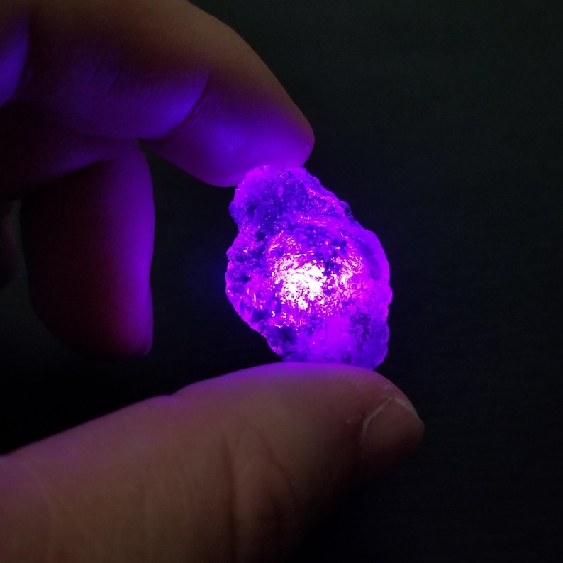 Purple power stone raw infinity stone glowing gem