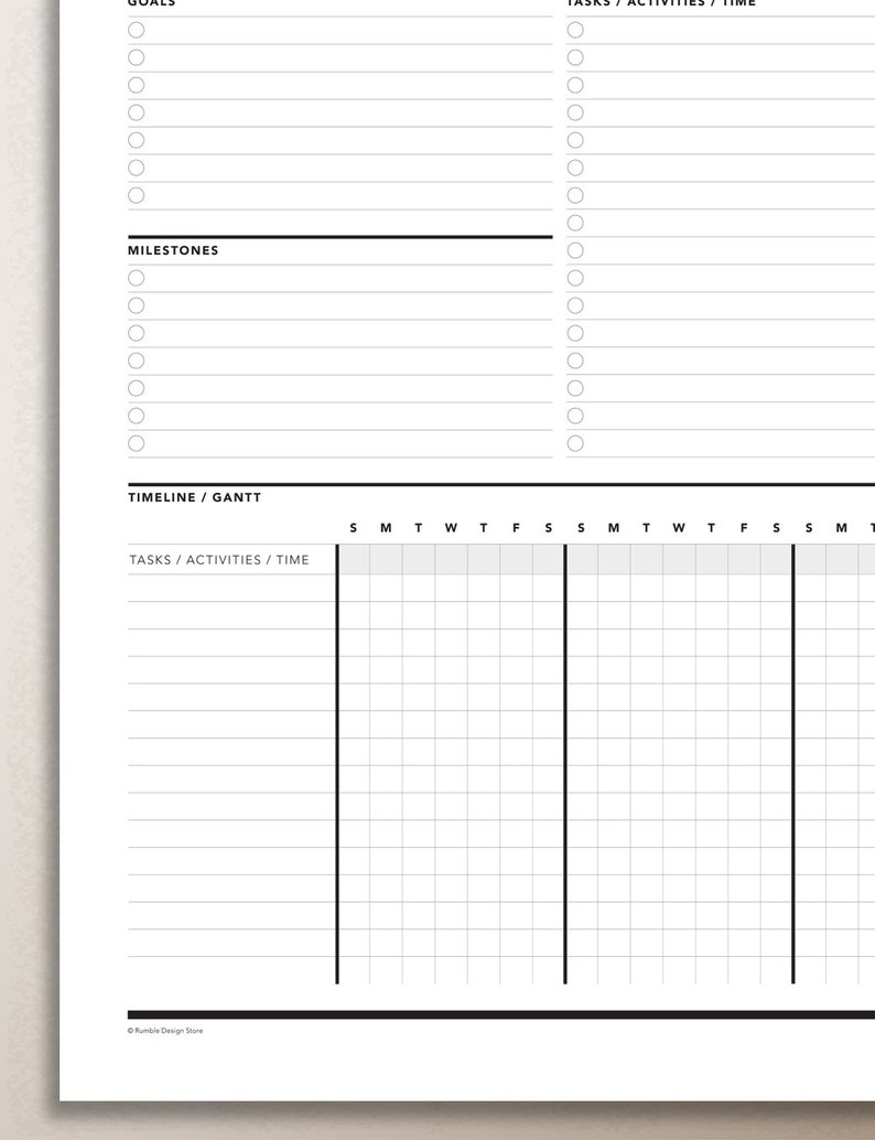 May include: A black and white printable planner with sections for goals, milestones, tasks, and a timeline/Gantt chart. The planner has a grid layout for scheduling and tracking progress.