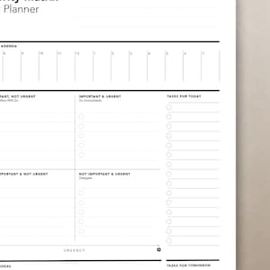 Peut inclure: Un planificateur de productivit&eacute; imprimable noir et blanc avec une matrice de priorit&eacute;, un agenda et des sections pour les t&acirc;ches d'aujourd'hui et de demain. Le planificateur comprend des sections pour les t&acirc;ches importantes et urgentes, les t&acirc;ches importantes et non urgentes, les t&acirc;ches non importantes et urgentes, et les t&acirc;ches non importantes et non urgentes.