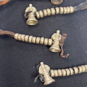 Brass Dorge leather prayer charm