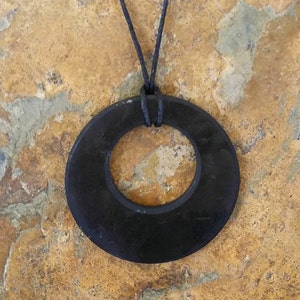 shungite  pendant eclipse pendant with a central hole