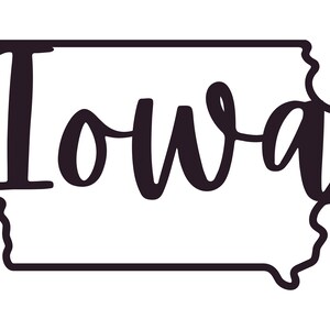 May include: A dark-colored outline of the state of Iowa with the word "Iowa" written in a cursive font within the state's borders. The design is simple and clean, with a focus on the state's shape and name.