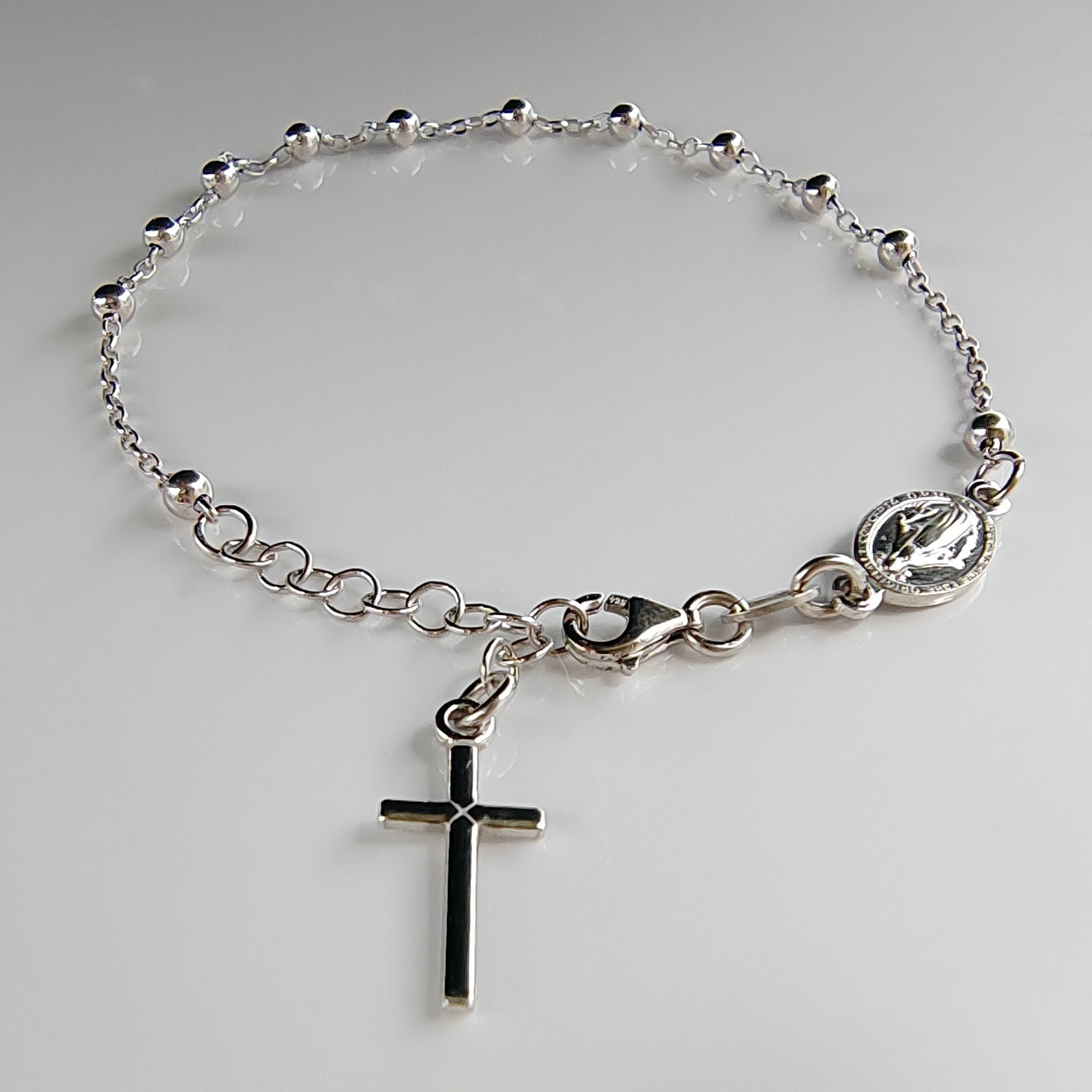 Bracciale Rosario con 3 Medaglie Madonna Miracolosa e 2 Croci gr 3,7 Bracciale Rosario con 3 Medaglie Madonna Miracolosa e 2 Croci gr 3,7