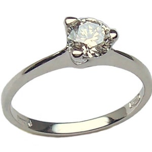 Solitary ring in 18 kt. white gold by woman with zircon idea gift engagement