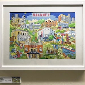 May include: A colorful illustration of Hackney, London, England. The illustration features buildings, streets, people, and a canal. The text "Hackney" is at the top of the illustration. The text "Empire" is on a building in the center of the illustration.