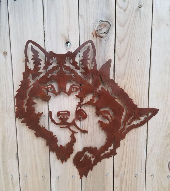 Items similar to Two Wolves Bonding Metal Art. Wolves Embrace. Rust