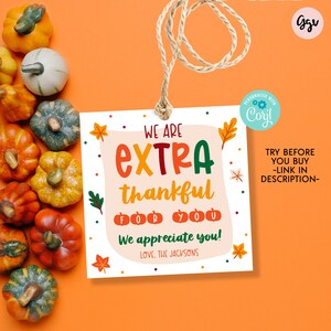 May include: A printable Thanksgiving gift tag with a fall theme. The tag features a pumpkin design and the text "We are extra thankful for you! We appreciate you! Love, The Jacksons".