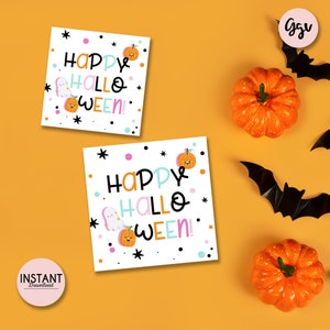 May include: Two printable Halloween cards with a white background and colorful text that says "Happy Hallo Ween!" with a ghost and pumpkin illustrations.