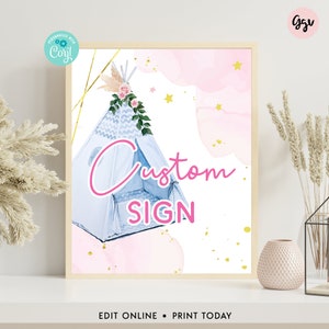 May include: A printable sign with a watercolor background featuring a blue teepee with pink and gold accents. The text "Custom Sign" is written in pink letters.
