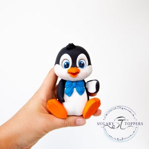Penquin cake topper for cake decorating birthday cake for kids made from sugarpaste fondant