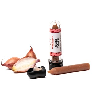 May include: A brown food crayon in a clear tube with a red and white label that says "Food Crayon" and "Shallot Echalote". The crayon is next to a small pile of shallots.