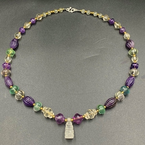 A rare collection of ancient crystals amethyst gems quality old beads necklace