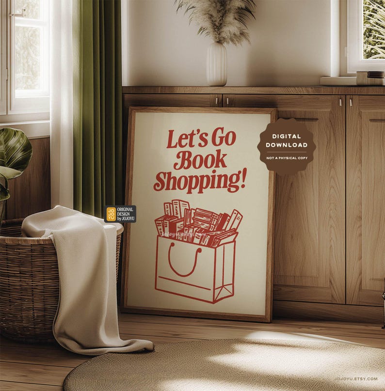 May include: A printable digital download poster with a red and white design. The poster features a shopping bag filled with books and the text "Let's Go Book Shopping!" in a red retro font.