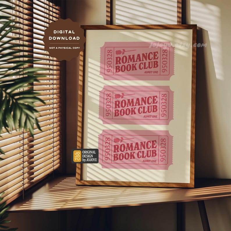 May include: A printable digital download of three pink tickets with the text "Romance Book Club" and the number "950328" on each ticket. The tickets are framed in a wooden frame.