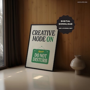 May include: A printable digital download of a poster with the text "Creative Mode On" in green and black lettering. Below the text is a green sign with the text "Please Do Not Disturb" in yellow lettering.
