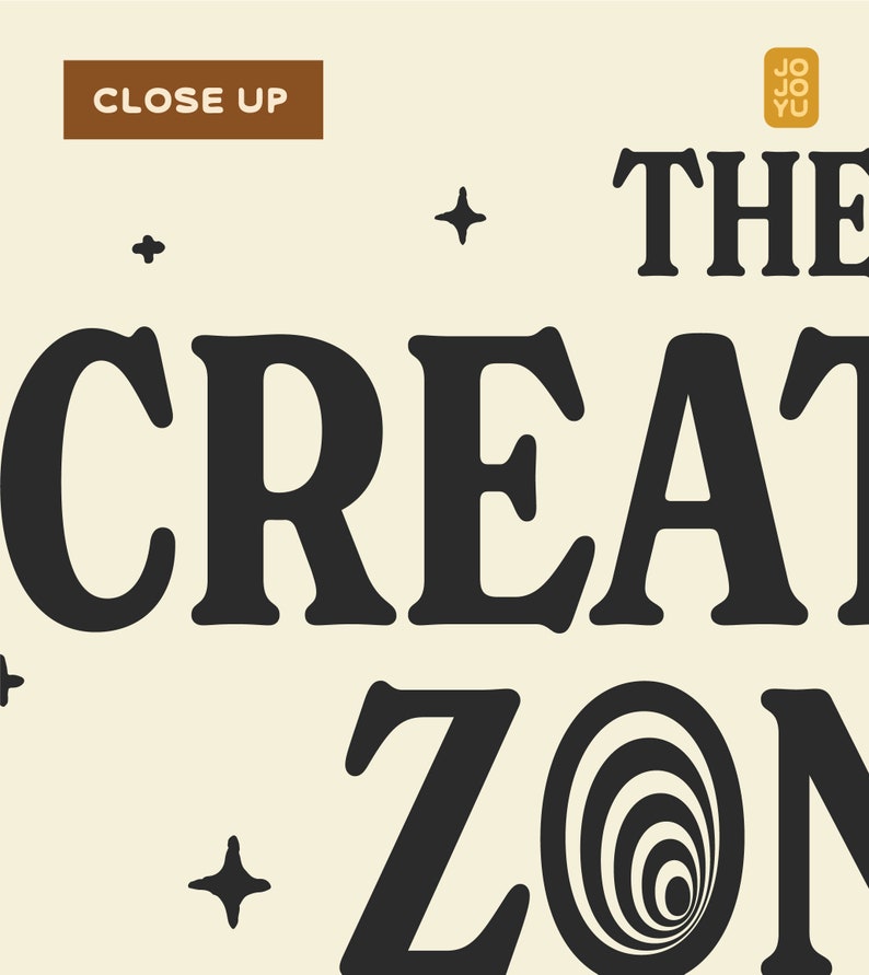May include: Black and white text on a beige background that reads "THE CREATIVE ZONE" with a black and white spiral design in the middle of the text. There are small black stars scattered around the text.
