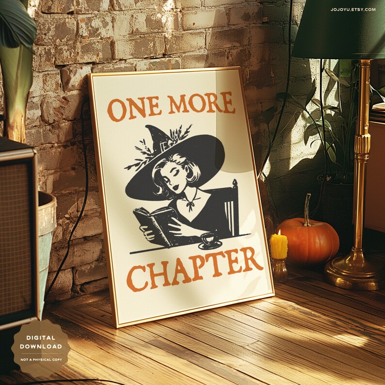 May include: A printable poster featuring a witch reading a book with the text "One More Chapter". The witch is wearing a black dress and a pointed hat with a floral embellishment. The poster has a vintage aesthetic with a cream background and orange text.