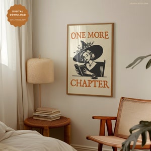 May include: A printable poster with a witch reading a book and a cup of tea. The poster has the text "One More Chapter" in orange letters.
