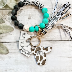 Mama Cow Wristlet Teal with little tags