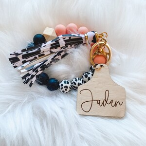 Peach Cow Wristlet With Personalized Tag