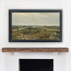 May include: A framed landscape painting depicting a river winding through a field of green and brown brush. The sky is a light gray with a few clouds.