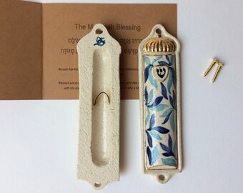 Ceramic mezuzah case, decorated with handpainted floral motifs and gold