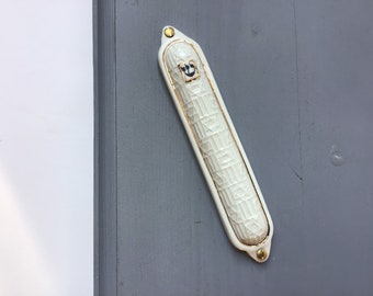 Mezuzah case, porcelain,motifs from the Dohany synagogue building