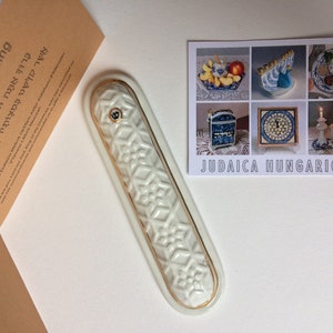 Mezuzah case- handmade ceramic,  motifs from the Rumbach Synagogue building, outdoor self-stick tape
