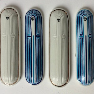 Porcelain mezuzah case with labyrinth motif