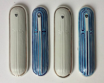 Porcelain mezuzah case with labyrinth motif