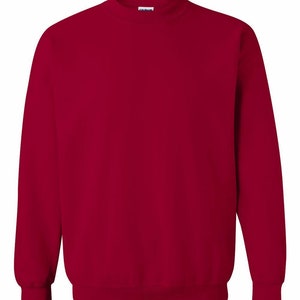 May include: A solid red crew neck sweatshirt.