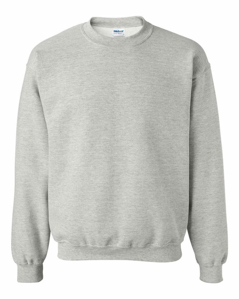 May include: A gray crewneck sweatshirt with a small tag on the front that says "Gildan" in blue.