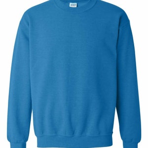 May include: A solid blue crew neck sweatshirt. The sweatshirt is made of a soft, comfortable fabric and has a relaxed fit.