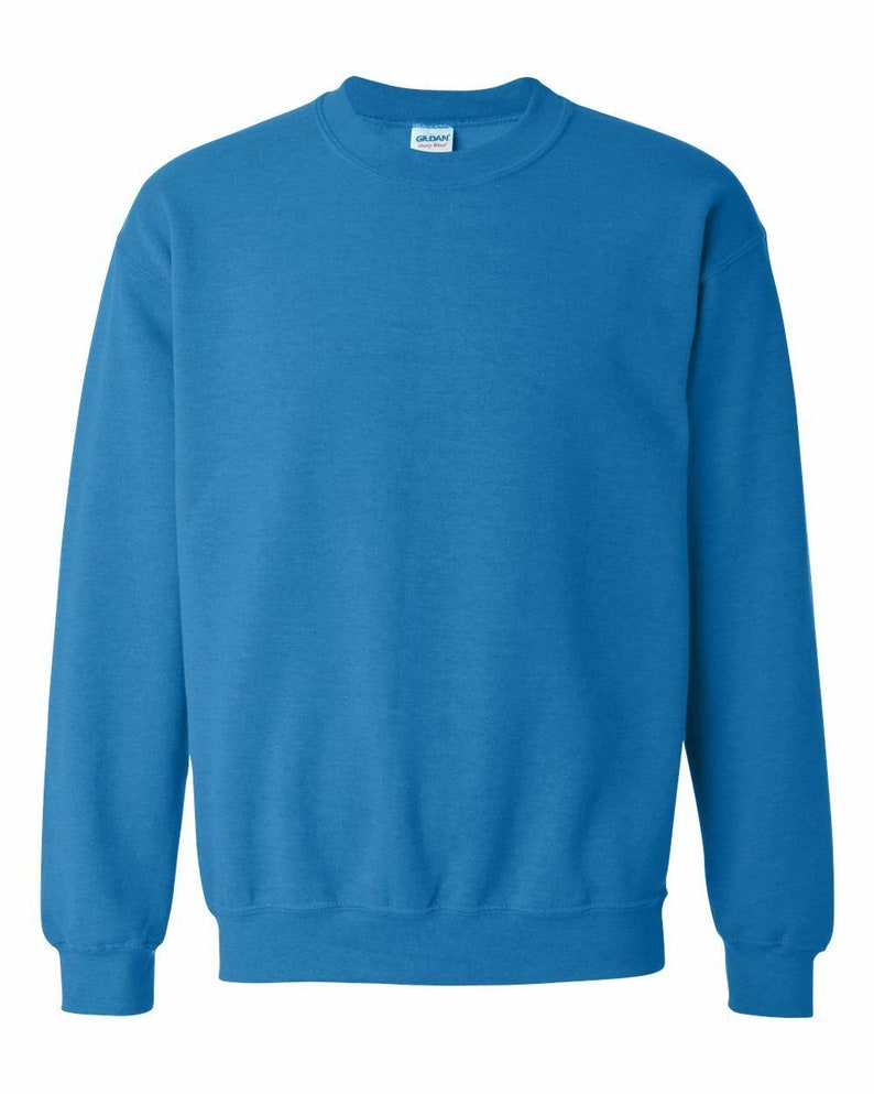 May include: A solid blue crew neck sweatshirt. The sweatshirt is made of a soft, comfortable fabric and has a relaxed fit.