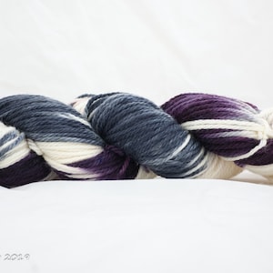 Grapes of Wrath hand dyed SW merino Aran yarn