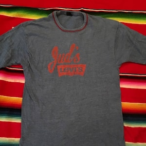 Vintage Juds Levi&#39;s Store T Shirt Life Int&#39;l &#39;60s Levis Levi Jeans USA Redline Big E