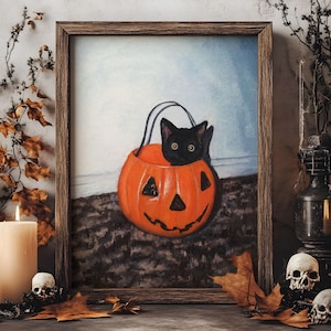May include: A black cat sits inside an orange jack-o'-lantern with a carved face. The cat is looking out of the pumpkin with its black eyes. The pumpkin is sitting on a brown surface.