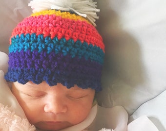 Regenboogbabymutsje, gehaakte regenboogbaby pomponmuts