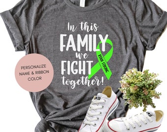 Lymphom Shirt, In dieser Familie kämpfen wir zusammen Shirt, Team Krebs Shirt, Lymphom Band, Kampf Krebs, Krebs Geschenk, Krebs Unterstützung