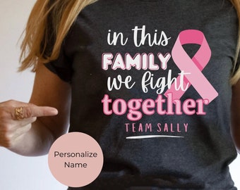Camicia Fight Cancer, In This Family We Fight Together, Camicia personalizzata per il cancro al seno, Nastro del cancro, Lotta contro il cancro, Regalo per il cancro, Supporto per il cancro